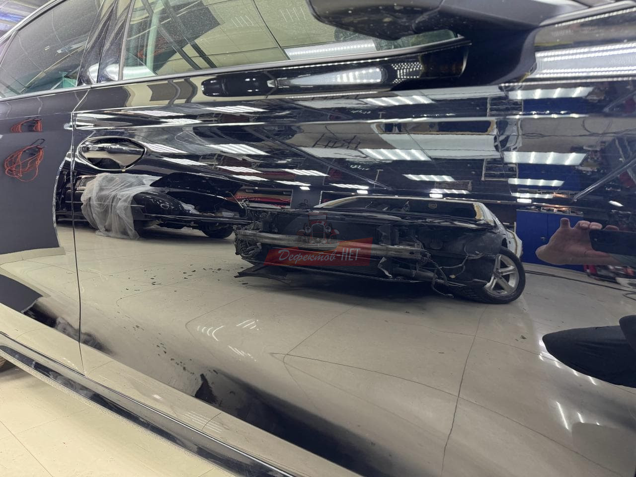 Удаление царапины на черном авто