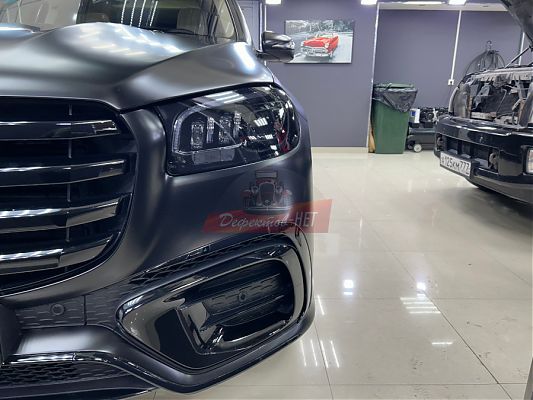 Оклейка тонировочной пленкой фар Mercedes