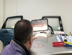 Процесс ремонта капота без покраски